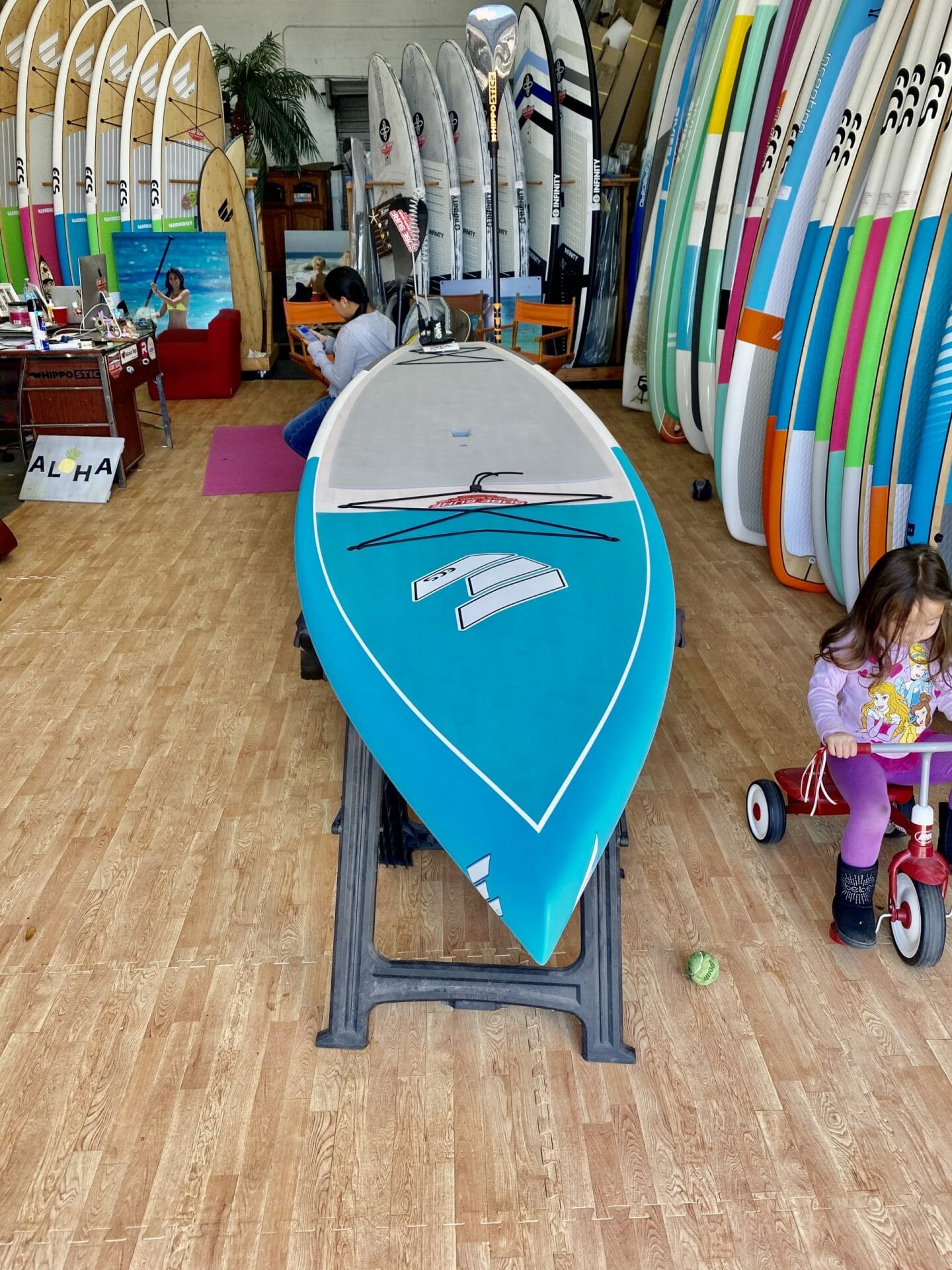 SOBE SURF & PADDLE SHOP PHOTO SoBe Surf Paddle Board Shop Florida Cocoa Beach Merritt Island Miami Owner Girard Middleton's daughter Audrey